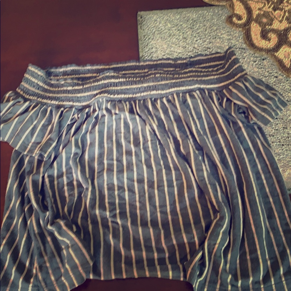 A blue and white off the shoulder top